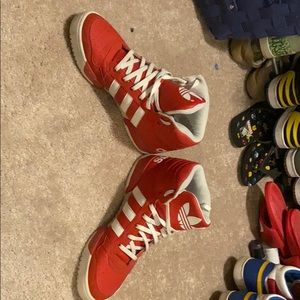 High top red adidas